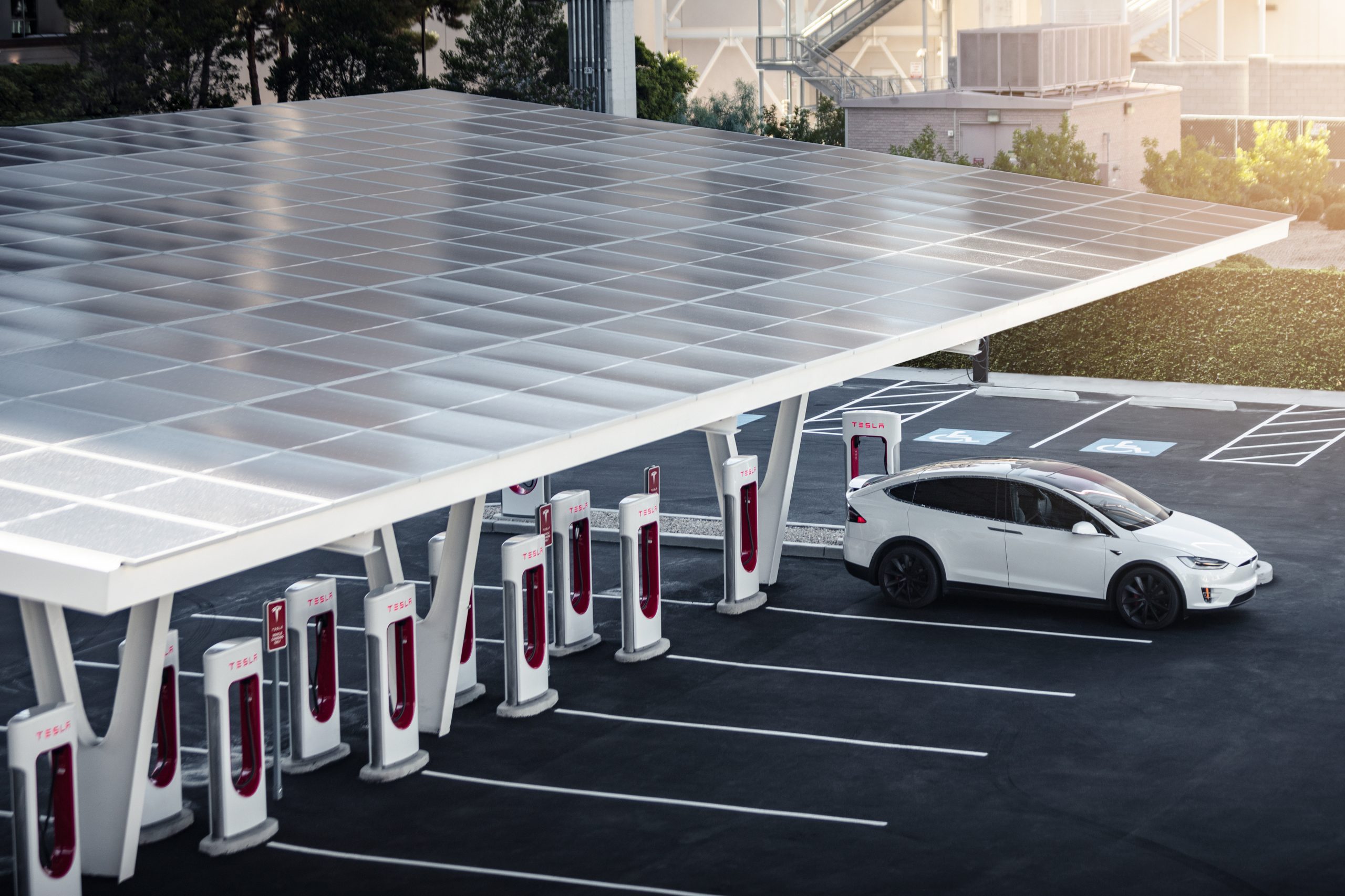 tesla supercharger from above with Model X charging