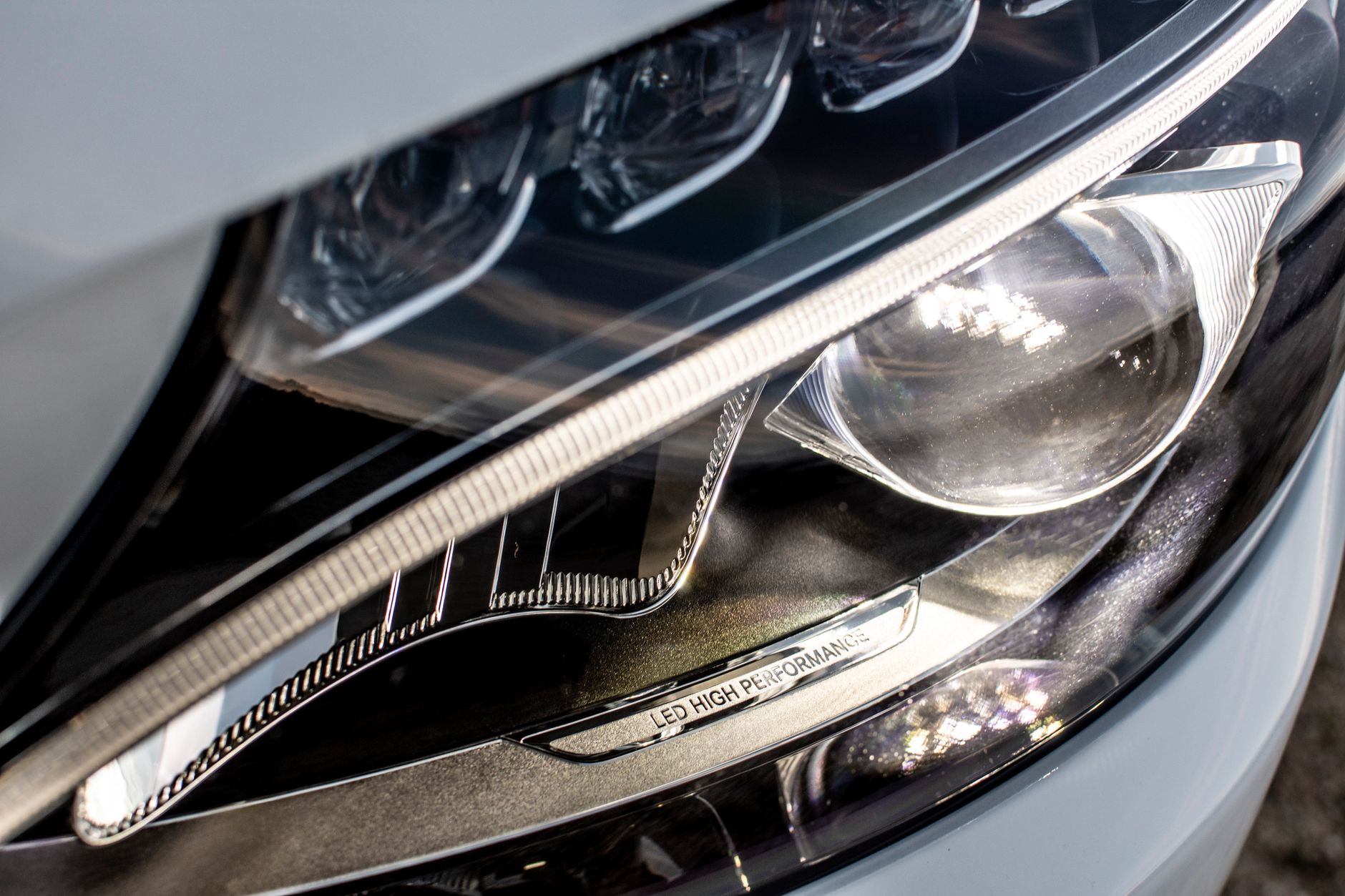 Aftermarket LED headlight showing beam scatter — a common cause of modified car MOT failure UK 2026